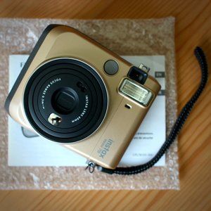 Fujifilm Instax Mini 70 Instant Film Camera (Gold)